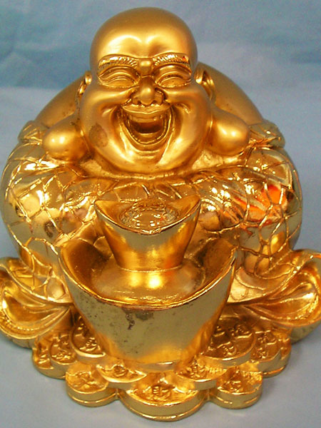 Smějící se Buddha ve zlatě